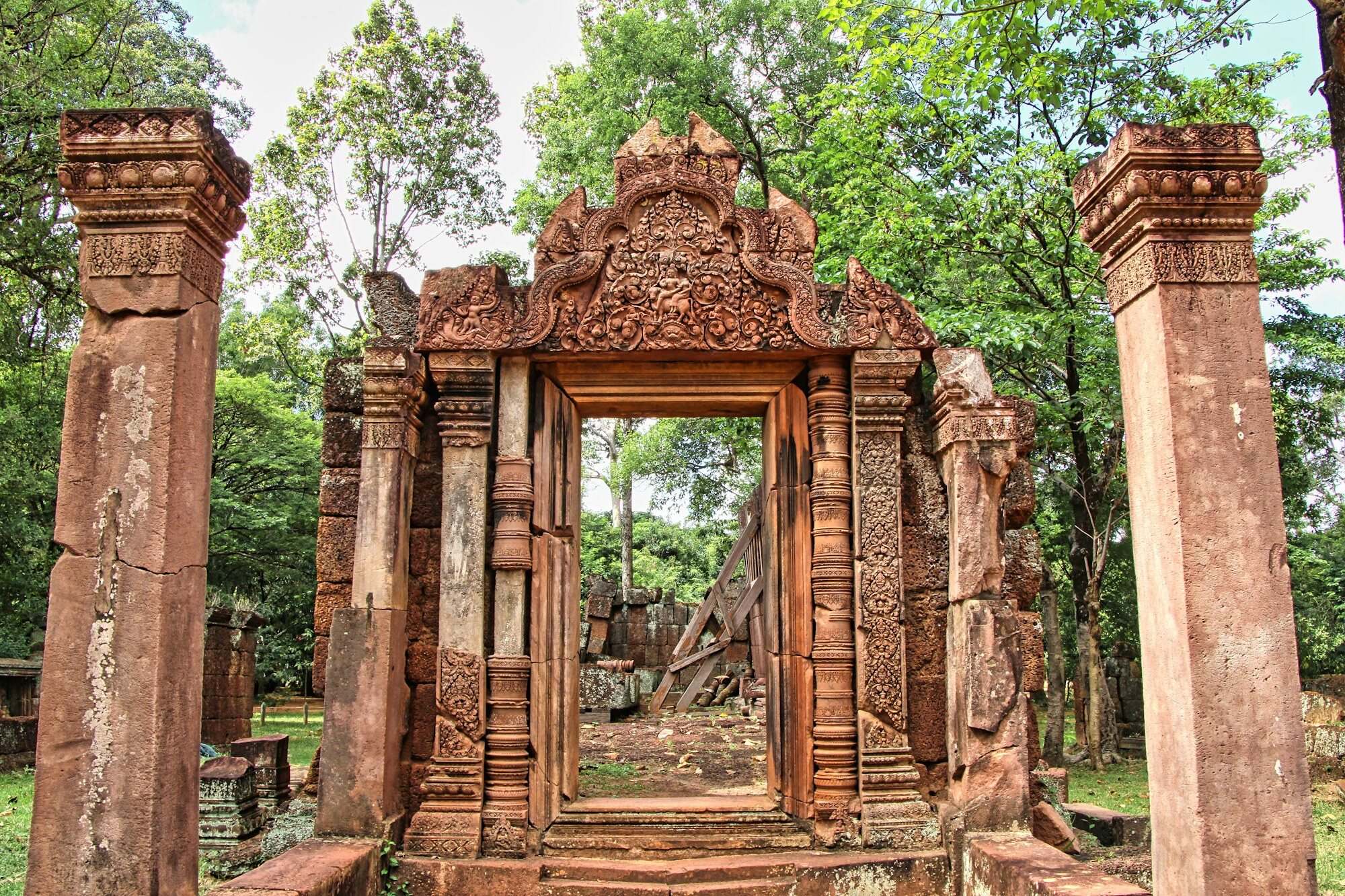 Banteay Srei temple intricate red stone carvings with detailed relief artwork