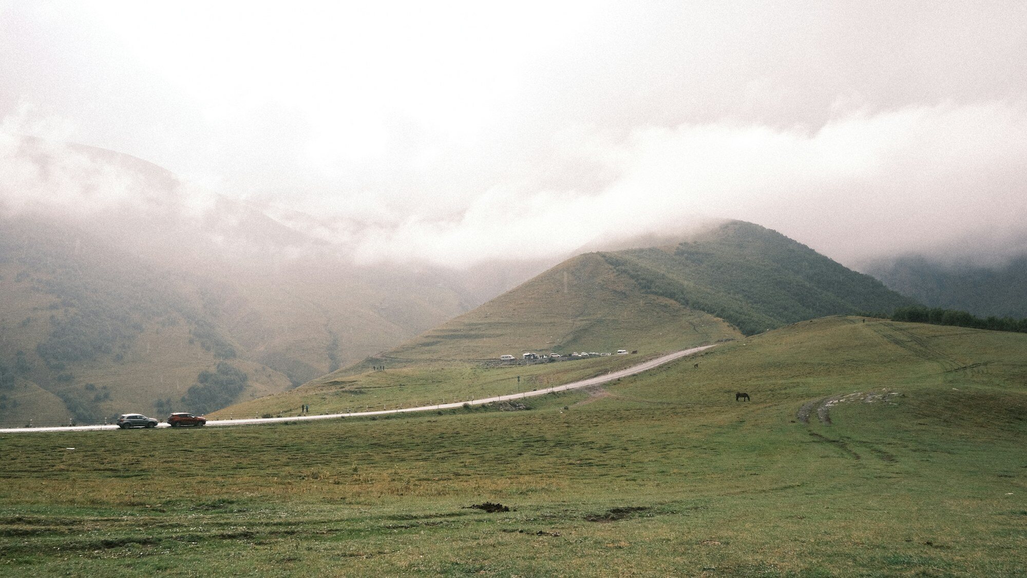 Car on a mountain road during the Kutaisi to Mestia approach through western Georgia