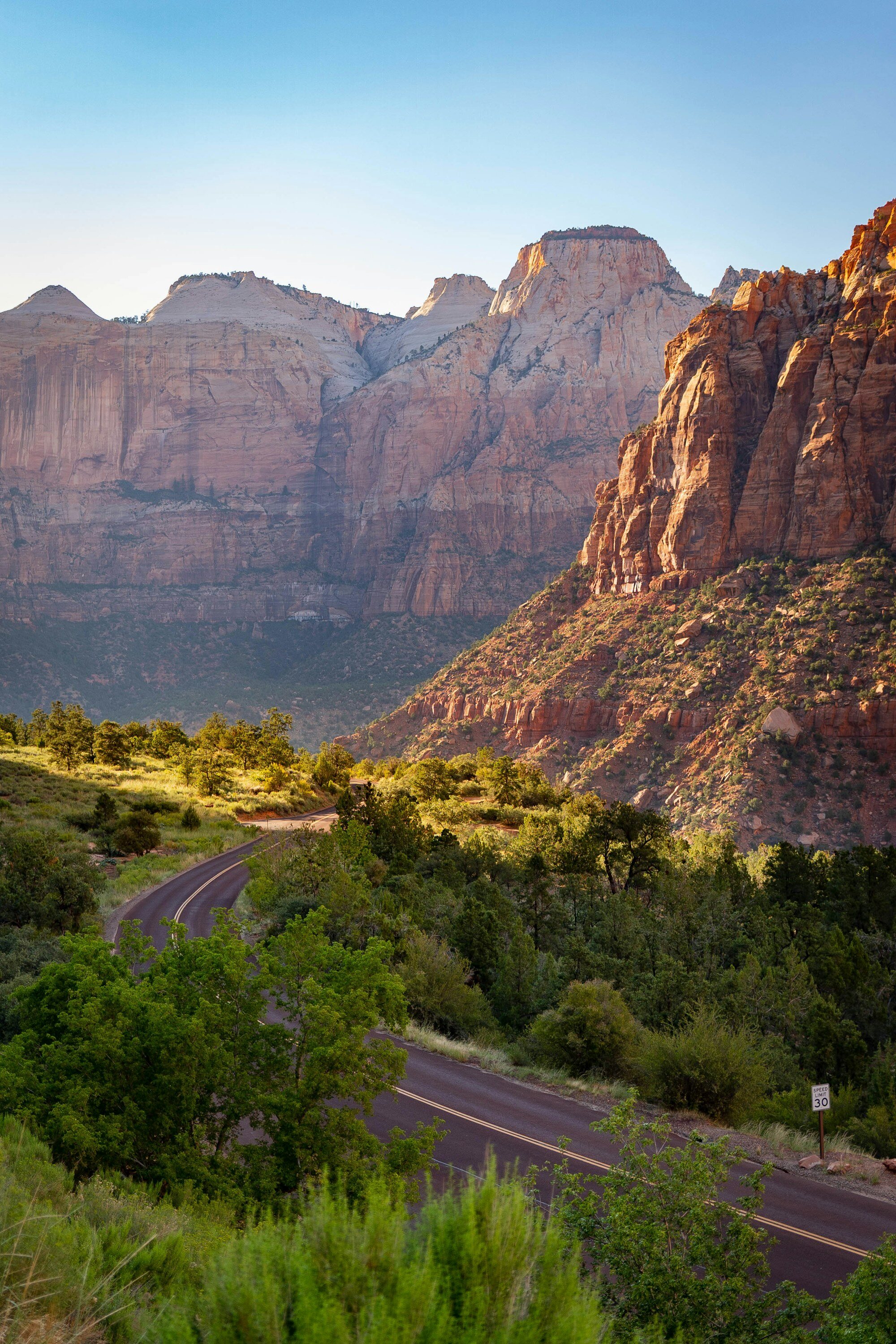 Zion National Park dramatic canyon scenery with towering orange and red rock formations